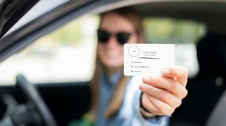 Leaving business cards on cars